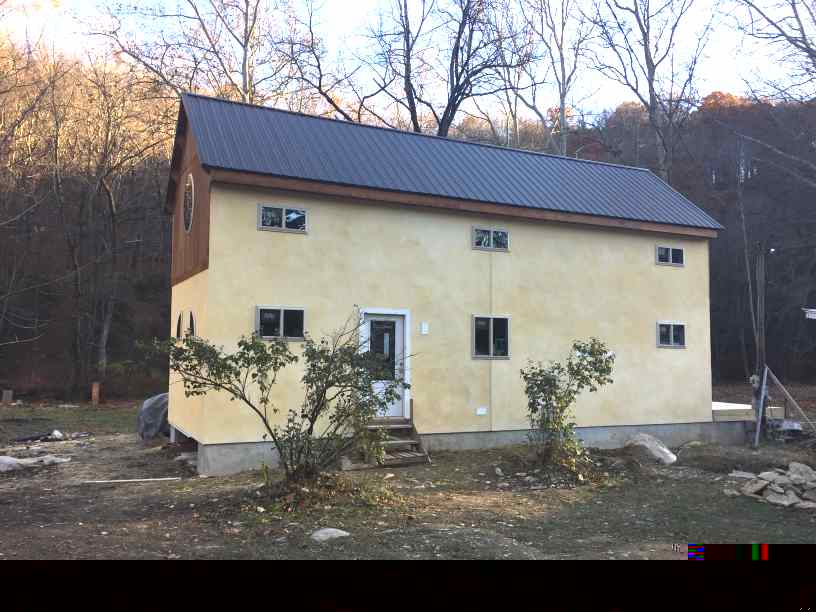 A small house by a stream in rural PA