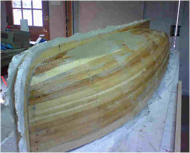 Hull covered with fiberglass cloth &amp; resin