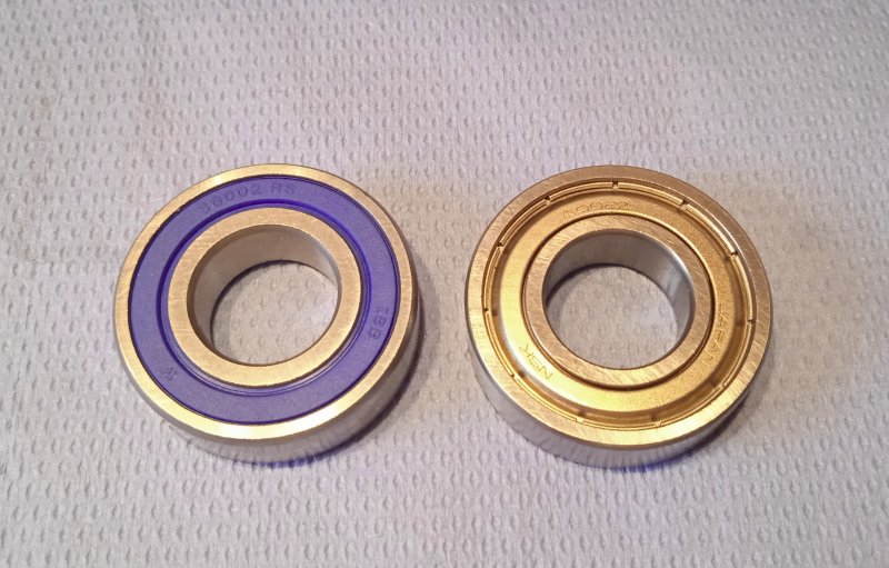 the original (right) and the replacement (left) ball bearings