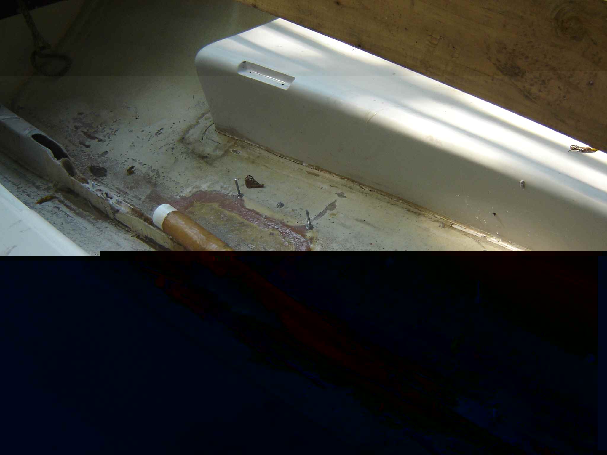 Propeller shaft fiberglassed into hull